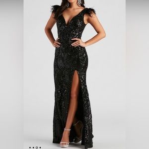 Black sequin gown with feathers